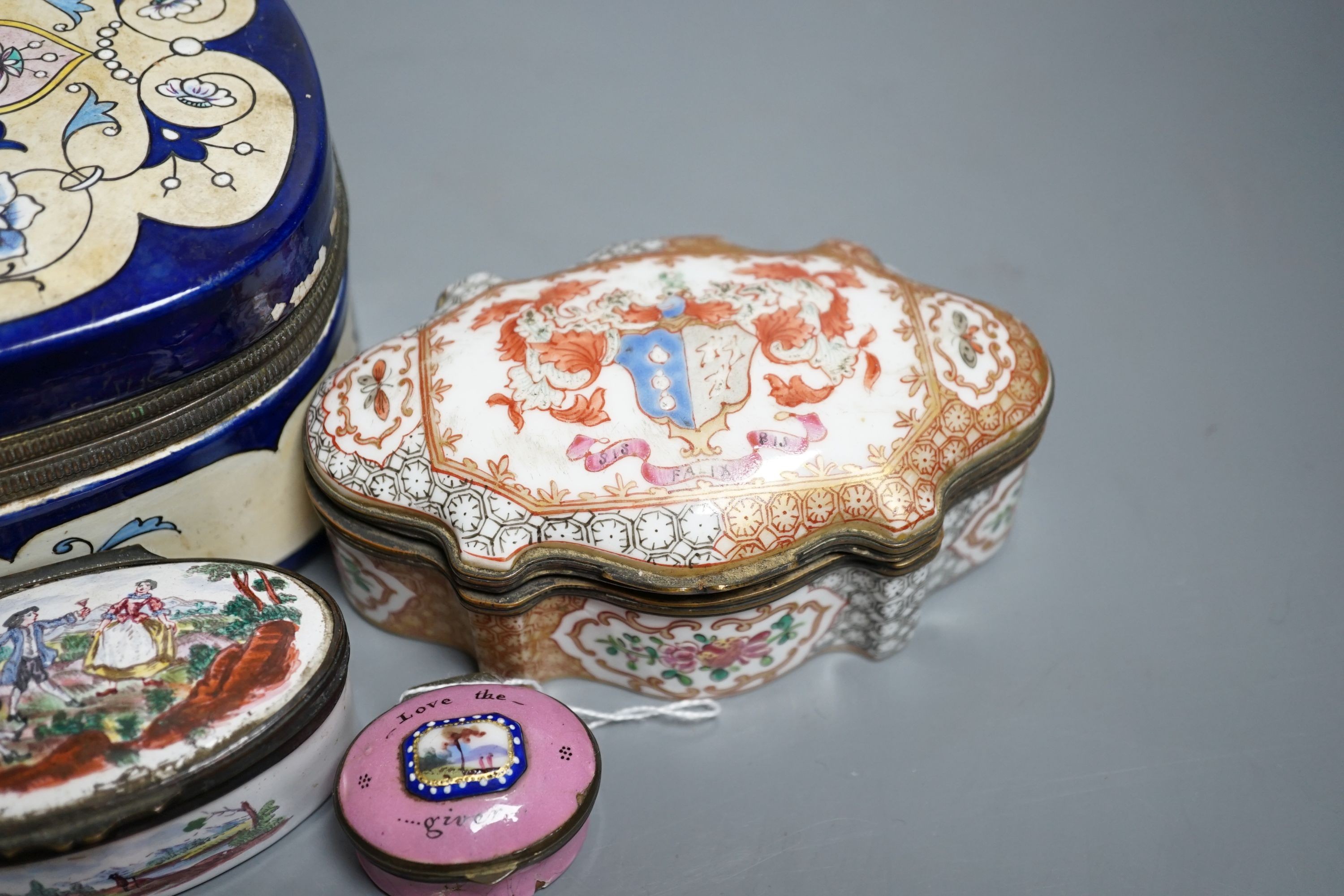 A group of five English and Continental enamel and porcelain patch and other boxes and two spirit labels, largest 20 x 8cm